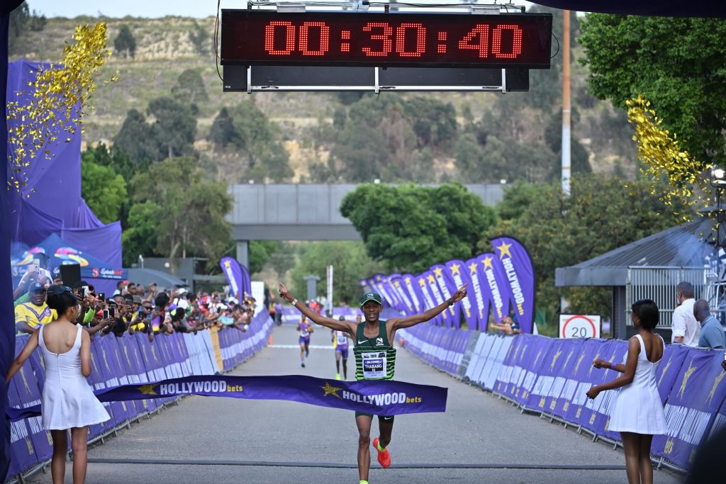 Hollywoodbets-Joburg-10km-mens-winner-Thabang-Mosiako crossing the finish line